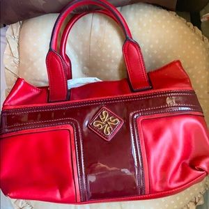 Vera Wang red leather handbag.